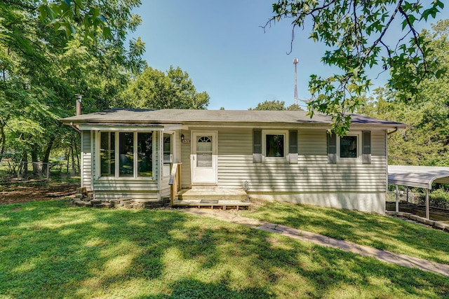1311 S 9th St, Ozark, MO 65721 - view of front of home featuring a front yard and a carport