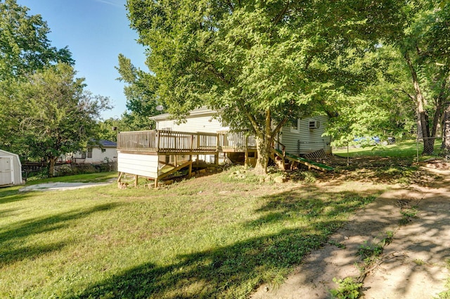 1311 S 9th St, Ozark, MO 65721 - back of house with stairway, a wooden deck, and a storage unit