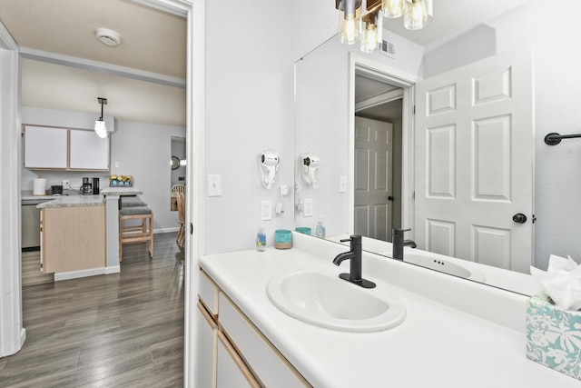 123 Bunker Ridge Dr Unit 7, Branson, MO 65616 - bathroom with vanity and wood finished floors