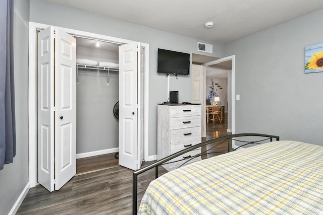 123 Bunker Ridge Dr Unit 7, Branson, MO 65616 - bedroom with dark wood finished floors and a closet