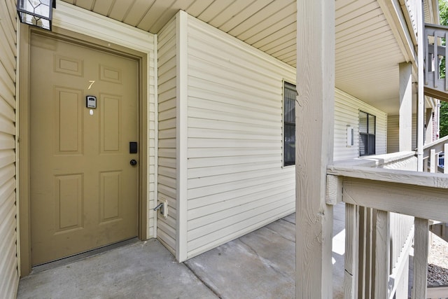123 Bunker Ridge Dr Unit 7, Branson, MO 65616 - property entrance with a porch