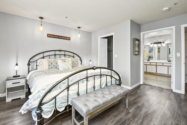 123 Bunker Ridge Dr Unit 7, Branson, MO 65616 - bedroom featuring wood finished floors and connected bathroom