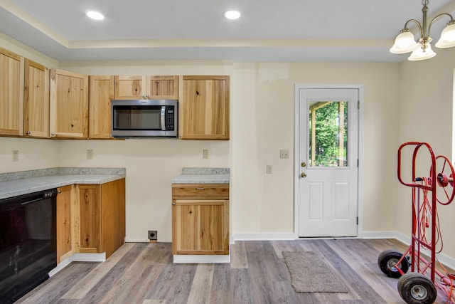 707 N College Ave, Republic, MO 65738 - kitchen featuring black dishwasher, stainless steel microwave, light wood-type flooring, light countertops, and recessed lighting