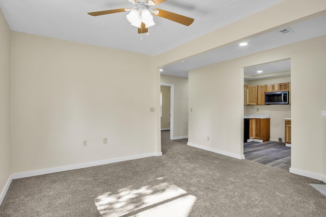 707 N College Ave, Republic, MO 65738 - unfurnished living room featuring carpet, ceiling fan, and recessed lighting