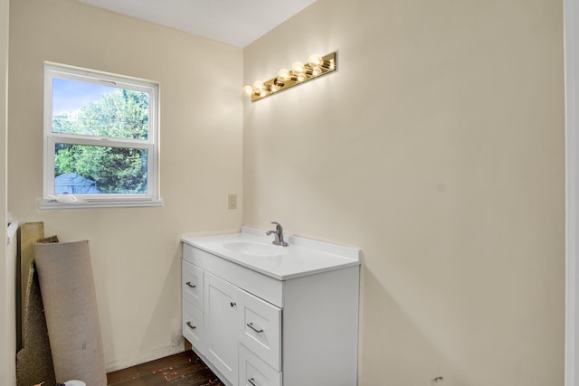707 N College Ave, Republic, MO 65738 - bathroom featuring vanity and wood finished floors
