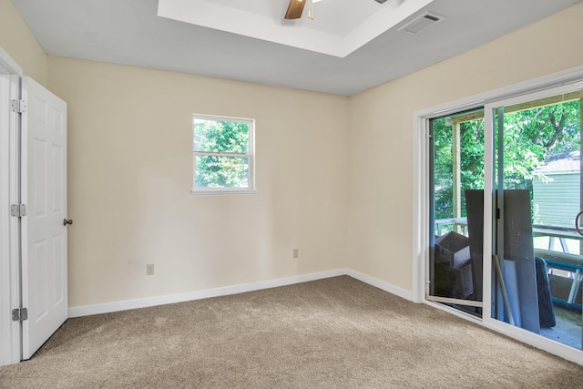 707 N College Ave, Republic, MO 65738 - carpeted empty room with healthy amount of natural light and ceiling fan