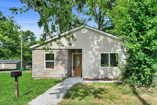 707 N College Ave, Republic, MO 65738 - view of front of property featuring stone siding and a front lawn