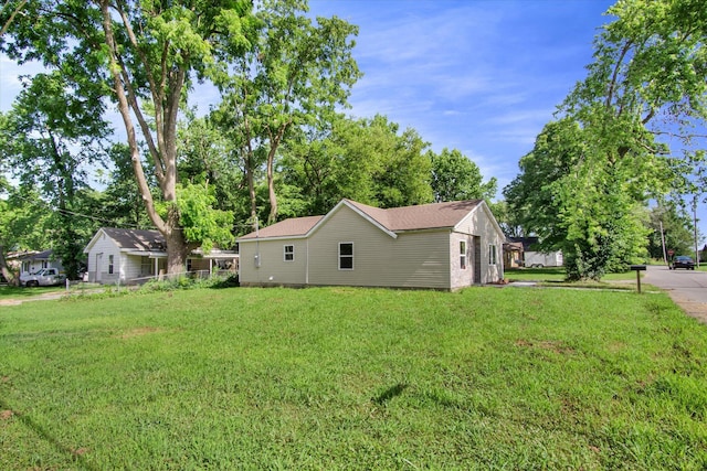 707 N College Ave, Republic, MO 65738 - view of home's exterior featuring a lawn