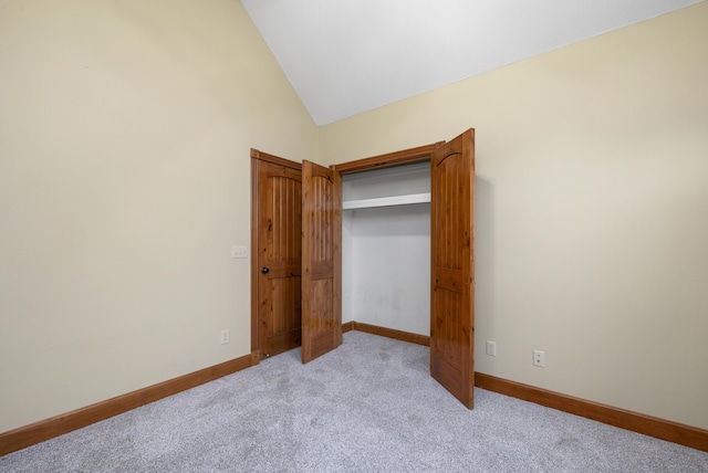 1225 W Wildcherry St, Ozark, MO 65721 - unfurnished bedroom with vaulted ceiling and light carpet