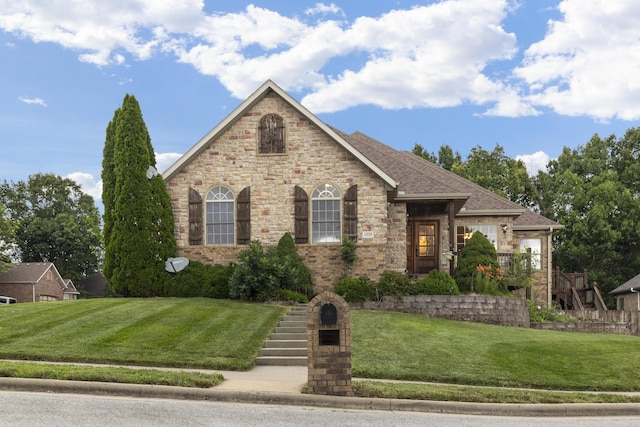 1225 W Wildcherry St, Ozark, MO 65721 - view of front of home featuring a front yard, stone siding, and stairs