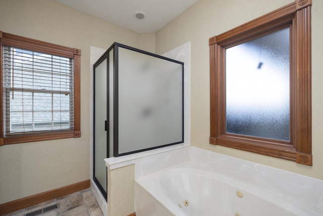 1225 W Wildcherry St, Ozark, MO 65721 - full bathroom with a shower stall, plenty of natural light, and a jetted tub