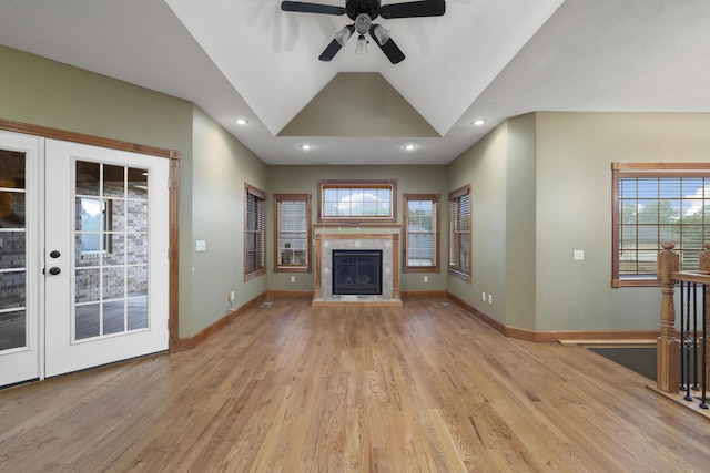 1225 W Wildcherry St, Ozark, MO 65721 - unfurnished living room featuring a ceiling fan, light wood finished floors, a glass covered fireplace, vaulted ceiling, and recessed lighting