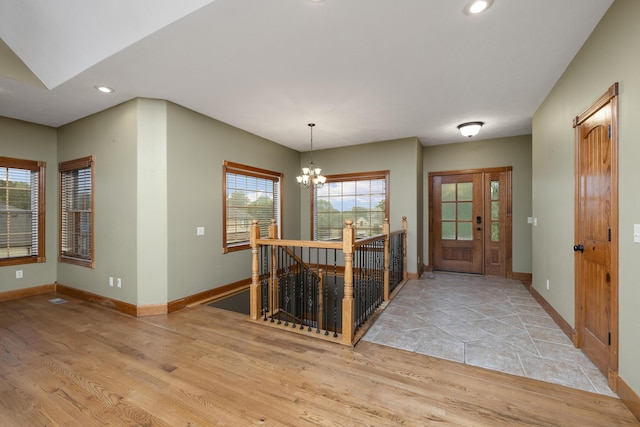 1225 W Wildcherry St, Ozark, MO 65721 - foyer with wood finished floors, a chandelier, and recessed lighting
