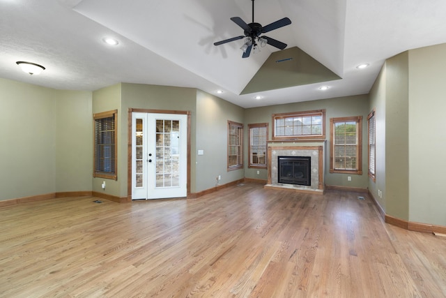 1225 W Wildcherry St, Ozark, MO 65721 - unfurnished living room with wood finished floors, ceiling fan, recessed lighting, a fireplace, and vaulted ceiling