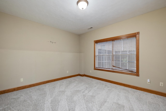1225 W Wildcherry St, Ozark, MO 65721 - carpeted spare room featuring baseboards