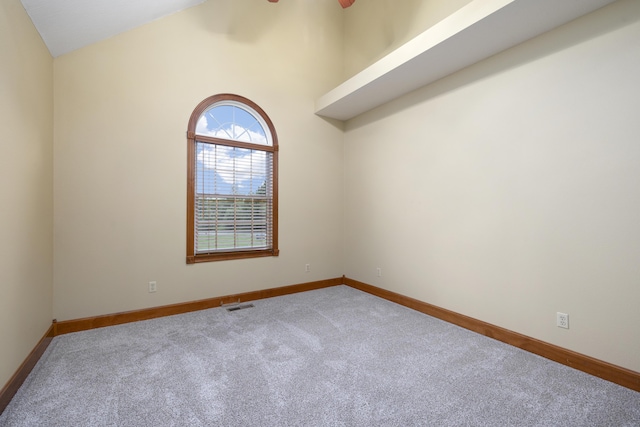 1225 W Wildcherry St, Ozark, MO 65721 - carpeted spare room featuring vaulted ceiling and a ceiling fan