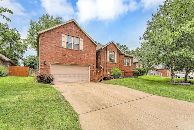 811 Gold Rush Ave, Nixa, MO 65714 - traditional home with a garage, brick siding, and driveway