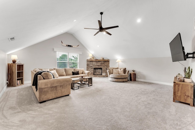 811 Gold Rush Ave, Nixa, MO 65714 - living area with carpet flooring, a ceiling fan, lofted ceiling, and a stone fireplace