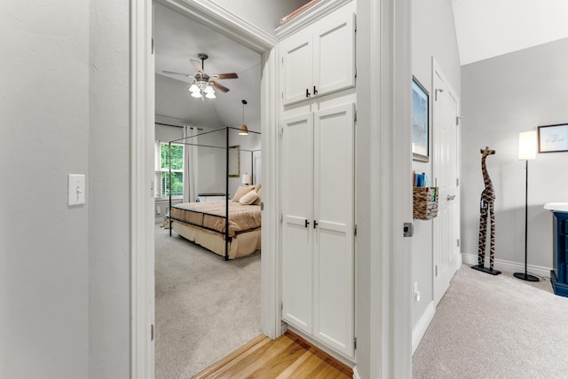 811 Gold Rush Ave, Nixa, MO 65714 - hallway featuring light colored carpet and baseboards