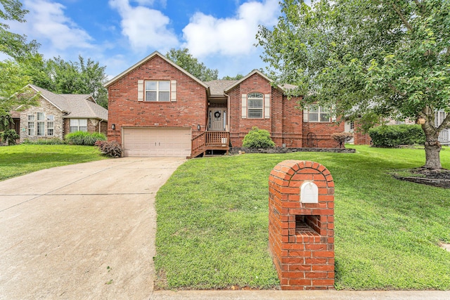 811 Gold Rush Ave, Nixa, MO 65714 - view of front of home with an attached garage, brick siding, a front yard, and driveway