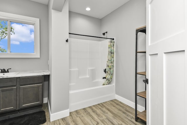 3918 Bowen Creek Rd, Niangua, MO 65713 - full bath with shower / bathtub combination with curtain, wood finished floors, vanity, and recessed lighting