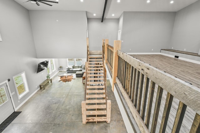 3918 Bowen Creek Rd, Niangua, MO 65713 - stairs featuring a high ceiling, recessed lighting, and a ceiling fan