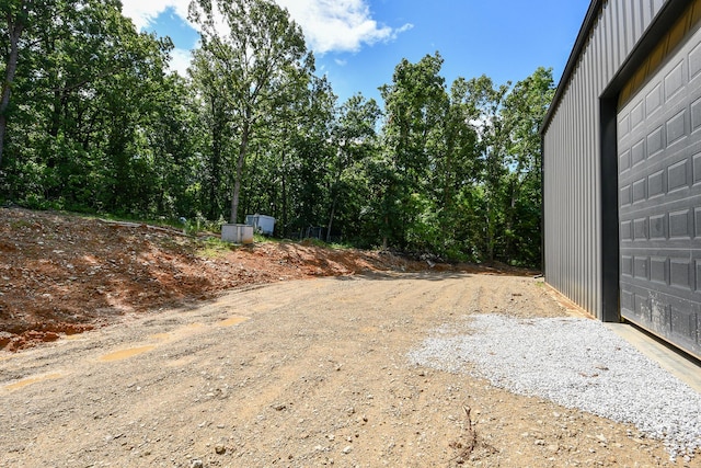 3918 Bowen Creek Rd, Niangua, MO 65713 - view of yard with a garage