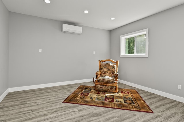 3918 Bowen Creek Rd, Niangua, MO 65713 - living area with a wall unit AC, recessed lighting, and wood finished floors