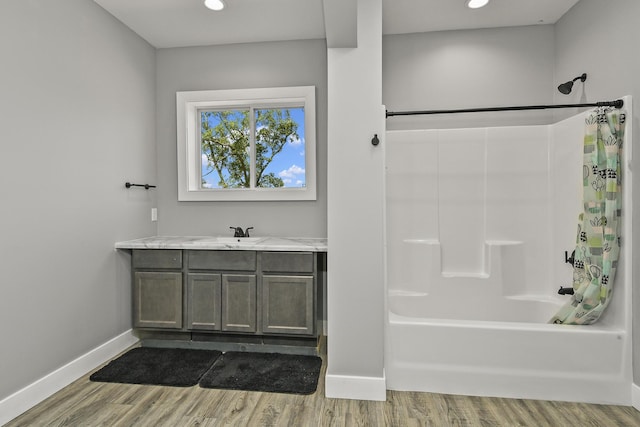3918 Bowen Creek Rd, Niangua, MO 65713 - bathroom with shower / bath combination with curtain, wood finished floors, vanity, and recessed lighting