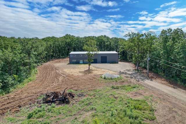 3918 Bowen Creek Rd, Niangua, MO 65713 - view of pole building featuring a wooded view