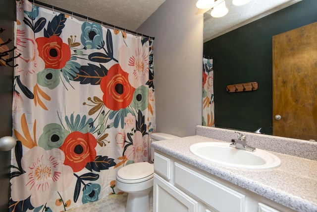 4252 W Madison St, Springfield, MO 65802 - bathroom featuring vanity, a textured ceiling, and a shower with shower curtain