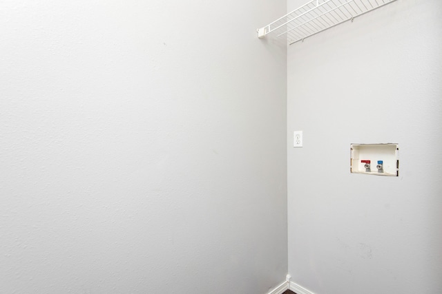 4252 W Madison St, Springfield, MO 65802 - washroom featuring hookup for a washing machine and baseboards