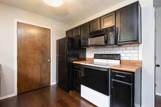 4252 W Madison St, Springfield, MO 65802 - kitchen with black appliances, butcher block countertops, dark wood-style floors, backsplash, and a textured ceiling