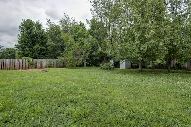 4252 W Madison St, Springfield, MO 65802 - fenced backyard featuring a shed