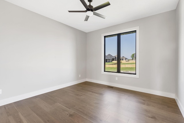 1632 Marlowe Ave, Springfield, MO 65802 - unfurnished room with ceiling fan and dark wood-style flooring
