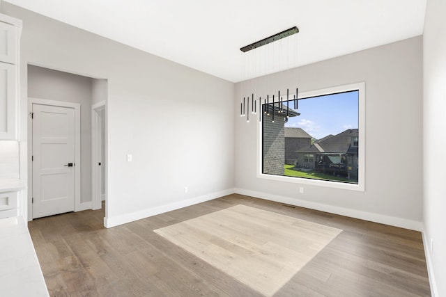 1632 Marlowe Ave, Springfield, MO 65802 - unfurnished room with wood finished floors