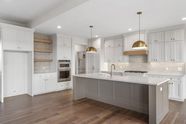 1650 Marlowe Ave, Springfield, MO 65802 - kitchen featuring stainless steel appliances, backsplash, open shelves, light countertops, and white cabinetry