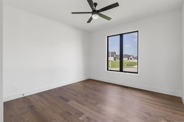 1650 Marlowe Ave, Springfield, MO 65802 - spare room with dark wood-style flooring and ceiling fan
