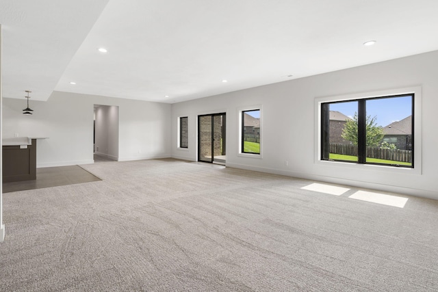 1650 Marlowe Ave, Springfield, MO 65802 - unfurnished living room featuring light carpet and recessed lighting