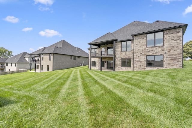 1650 Marlowe Ave, Springfield, MO 65802 - back of property with a balcony, brick siding, and a shingled roof