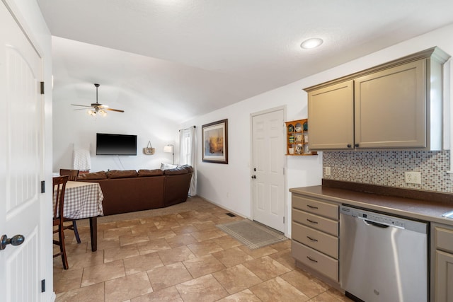 1300 W Robin St, Ozark, MO 65721 - kitchen featuring dishwasher, dark countertops, decorative backsplash, ceiling fan, and vaulted ceiling