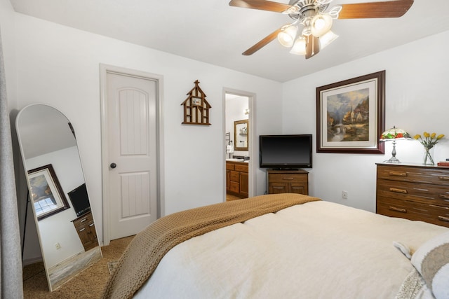 1300 W Robin St, Ozark, MO 65721 - bedroom with carpet floors, ensuite bath, and ceiling fan