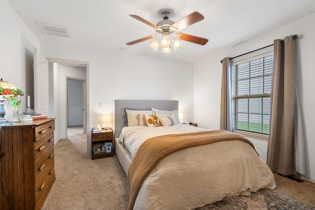 1300 W Robin St, Ozark, MO 65721 - carpeted bedroom with a ceiling fan