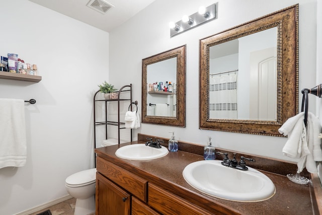 1300 W Robin St, Ozark, MO 65721 - full bath featuring toilet and double vanity