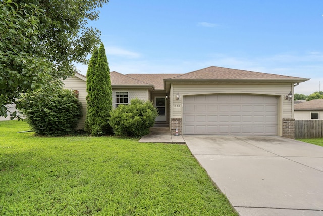 1300 W Robin St, Ozark, MO 65721 - ranch-style house featuring brick siding, a garage, driveway, and roof with shingles