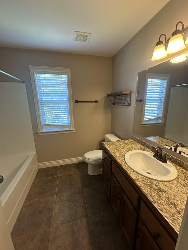 5605 N Seacrest Dr, Ozark, MO 65721 - full bath featuring vanity, tile patterned flooring, and bathing tub / shower combination