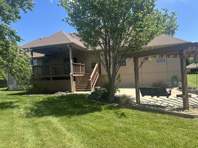 5605 N Seacrest Dr, Ozark, MO 65721 - rear view of property with stairs, a shingled roof, a patio area, a lawn, and a deck
