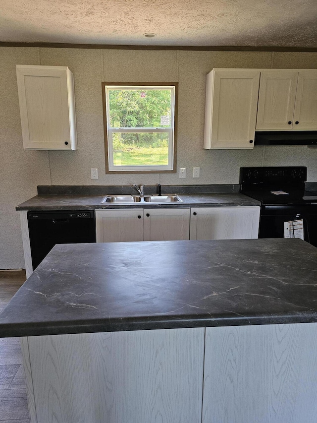 000 Oak St, Conway, MO 65632 - kitchen with black appliances, under cabinet range hood, dark countertops, white cabinetry, and a textured ceiling