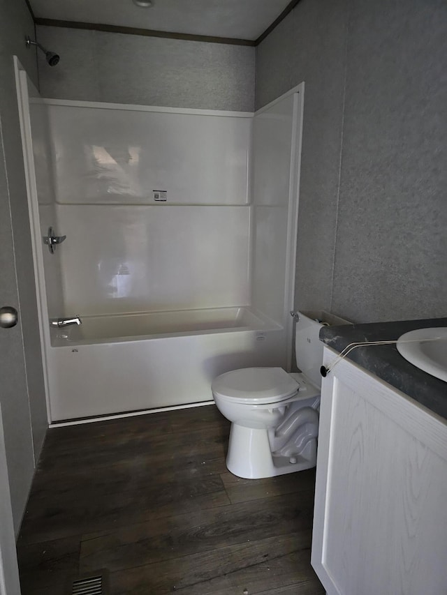 000 Oak St, Conway, MO 65632 - bathroom featuring wood finished floors, vanity, and shower / washtub combination