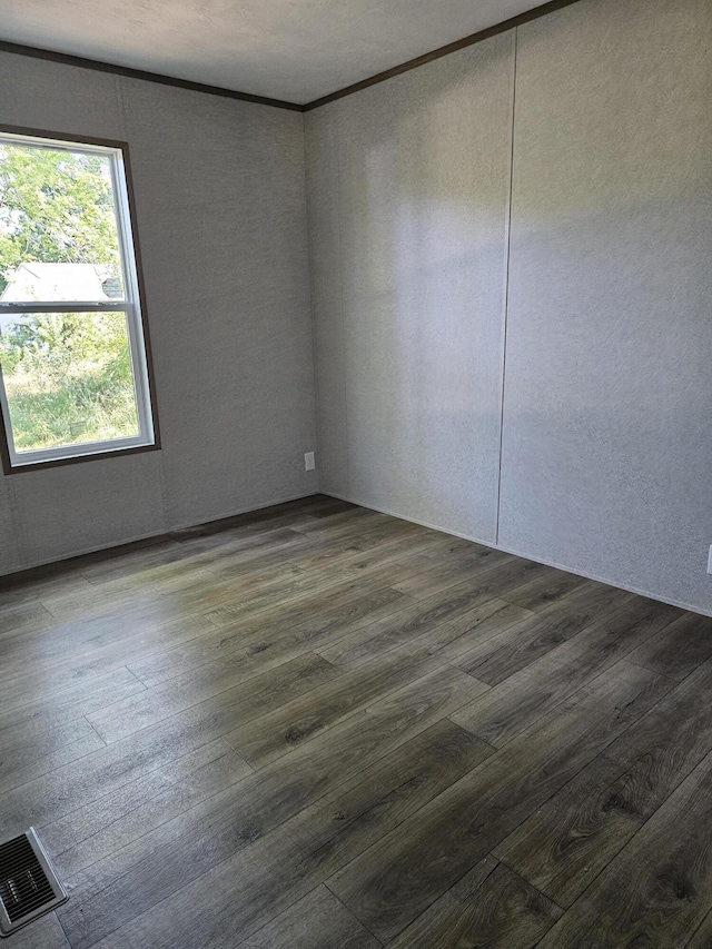 000 Oak St, Conway, MO 65632 - spare room with wood finished floors and crown molding